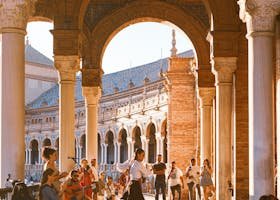 Dynamic street performance at Plaza de España, showcasing Spanish culture and architecture.